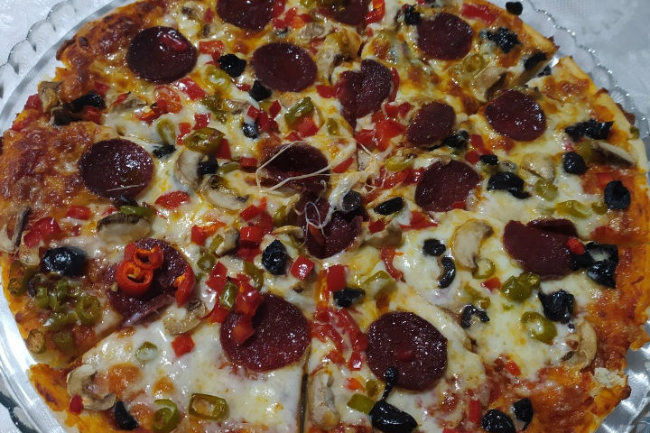 https://yemek.com/tarif/borcamda-pizza/ | Borcamda Pizza Tarifi