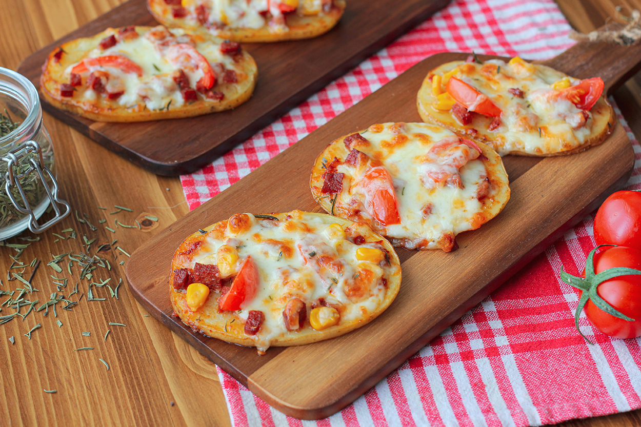 https://yemek.com/tarif/patates-dilim-pizza/ | Patates Dilim Pizza Tarifi